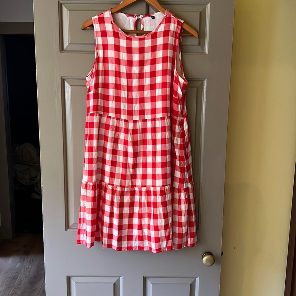 Bright red sundress. Slightly worn. Size M.